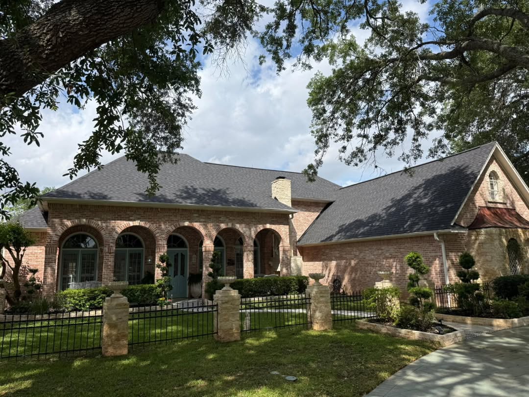 Completed Pulse Restoration roof on a brick home